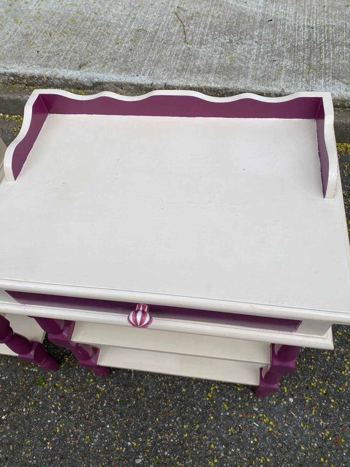 2 vintage bedside tables painted in white and purple with a drawer.
