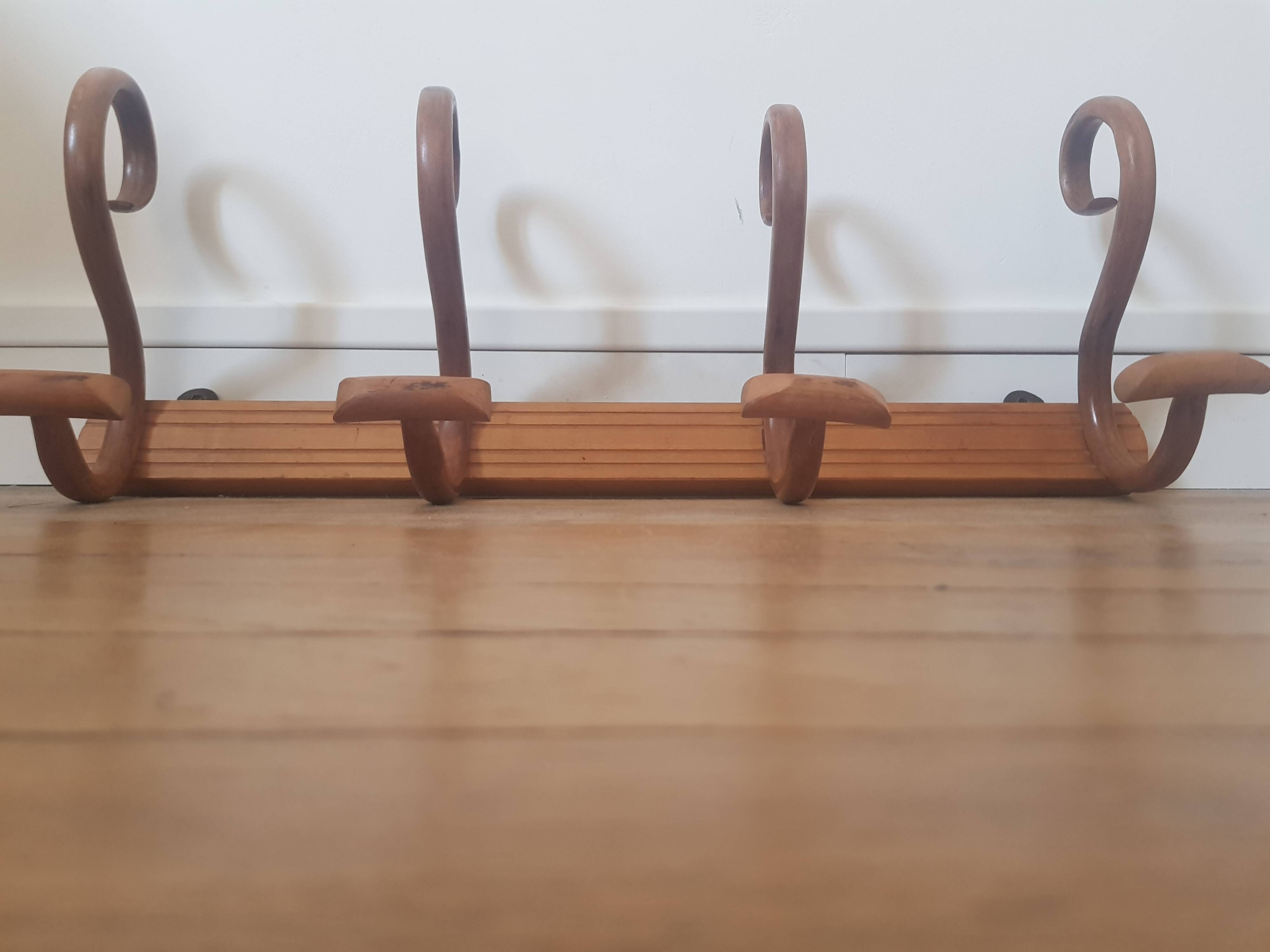Wooden wall coat rack