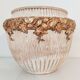Terracotta pot cache golden flowers
