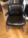 Pair of leather armchairs in 70s style