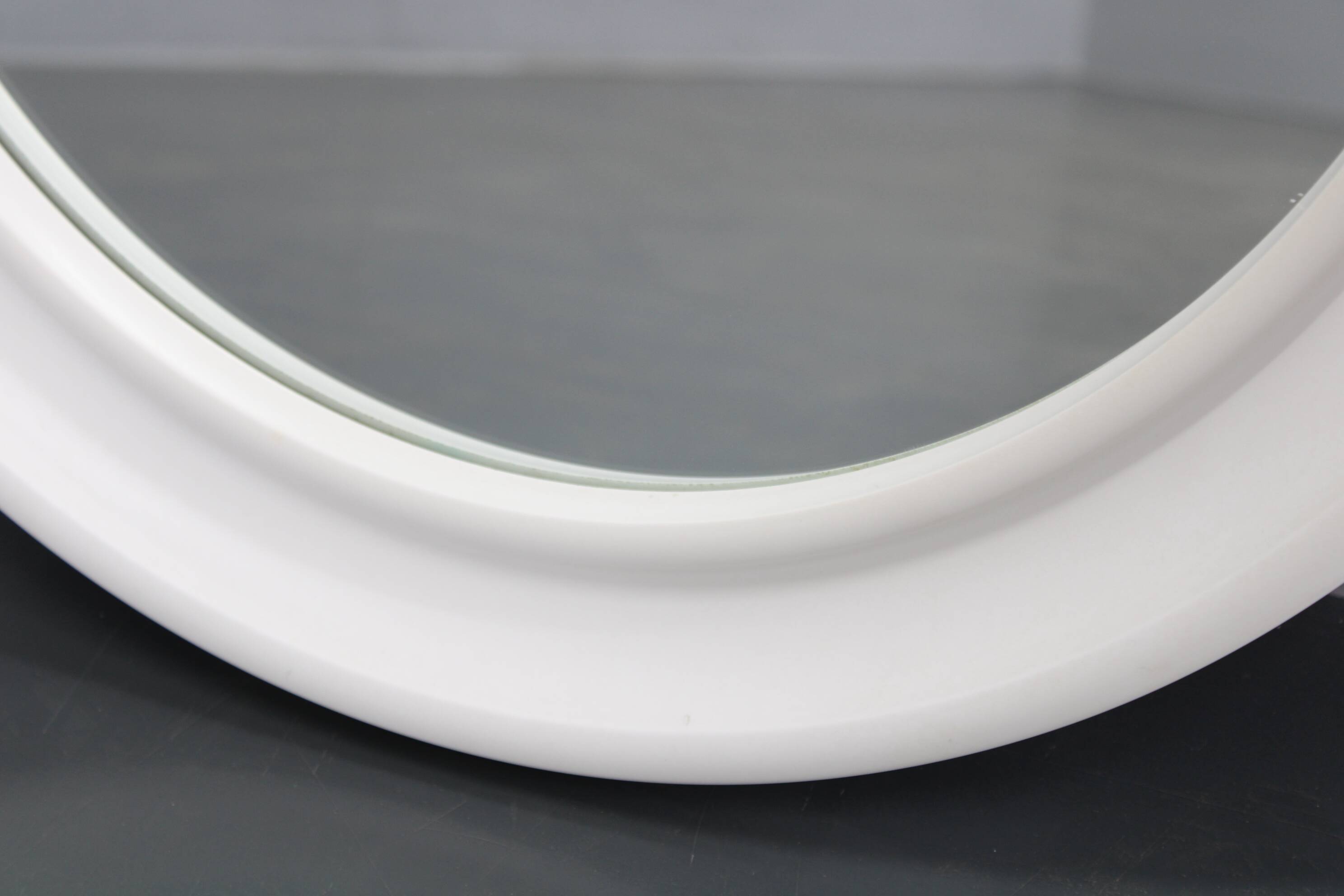 1970s Italian round mirror by Carrara and Matta America Brevettato, white plastic