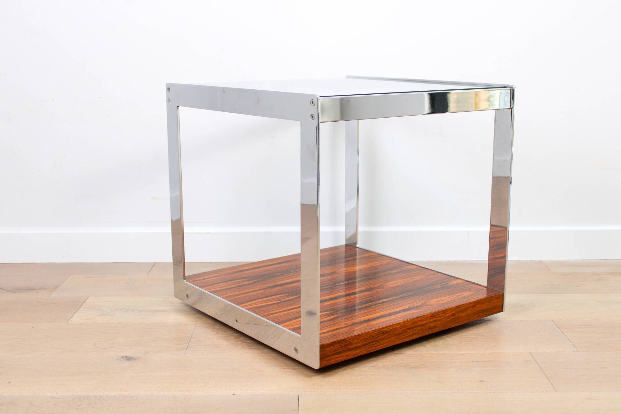 A vintage mid-century glass and rosewood side table by Merrow Associates