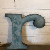 Blue sign letter "R"