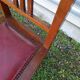 6 Art Deco dining chairs in solid wood and burgundy leather.