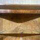 19th-century English corner cabinet in oak, mahogany, and fir.
