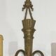 Pair of Louis XVI style bronze wall sconces with quivers and ribbons