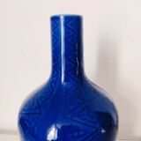 Blue vase geometric incised decoration