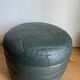 Green patchwork leather pouf from Sède