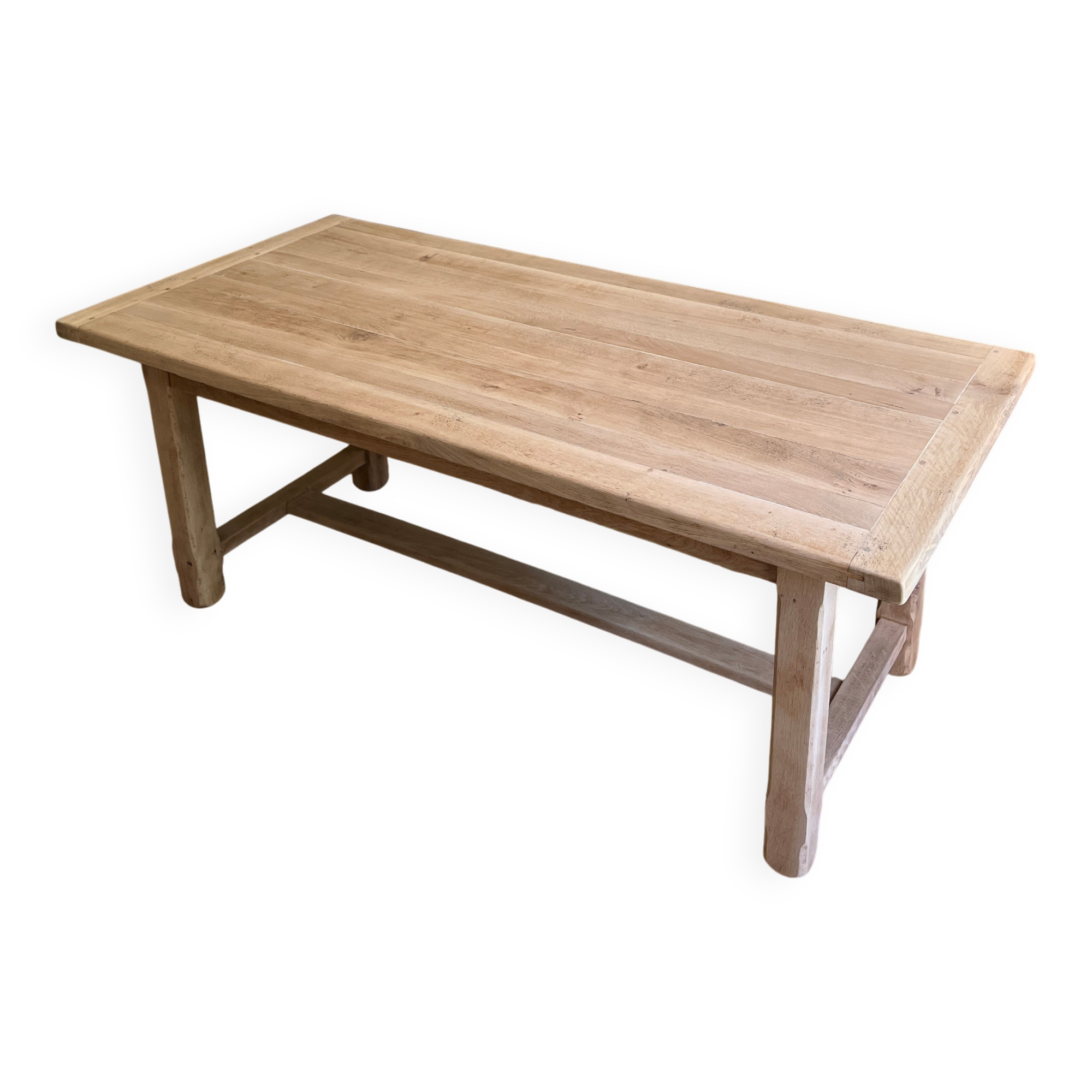 Farm table made of solid light oak wood.