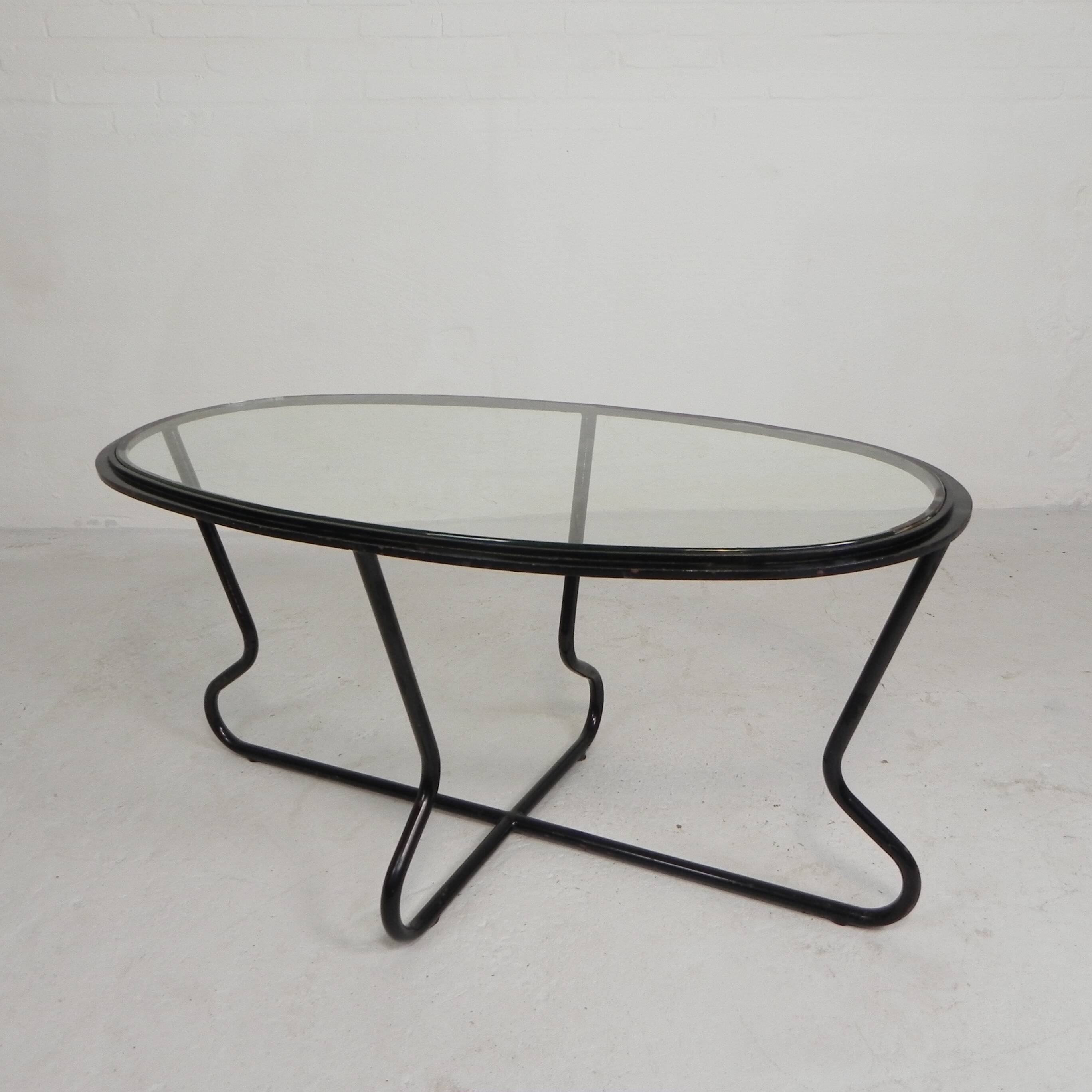 Set of 4 armchairs and a coffee table with tubular structure in Bauhaus style, 1950s.