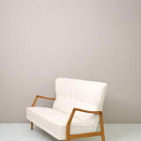 Vintage Scandinavian sofa with faux lambskin