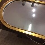 Miroir en bois et stuc doré