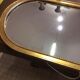 Miroir en bois et stuc doré