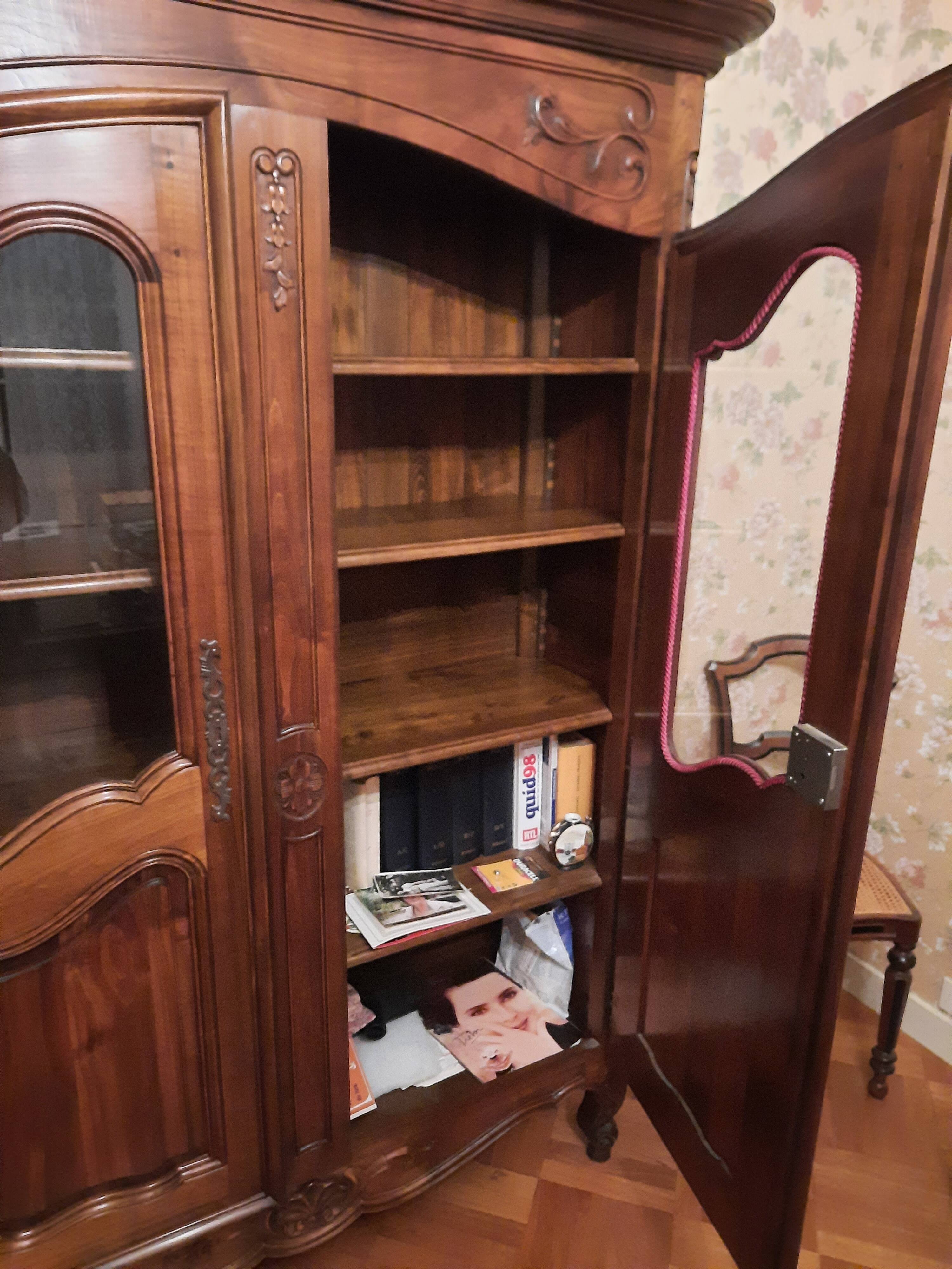 Regency bookcase in solid cherry wood stained walnut.