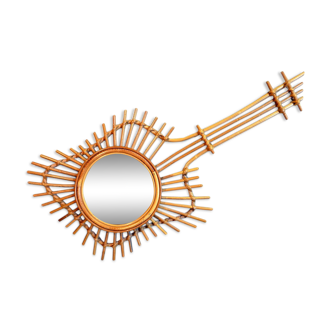 Vintage rattan mirror guitar shape