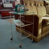 Brass and glass magazine door