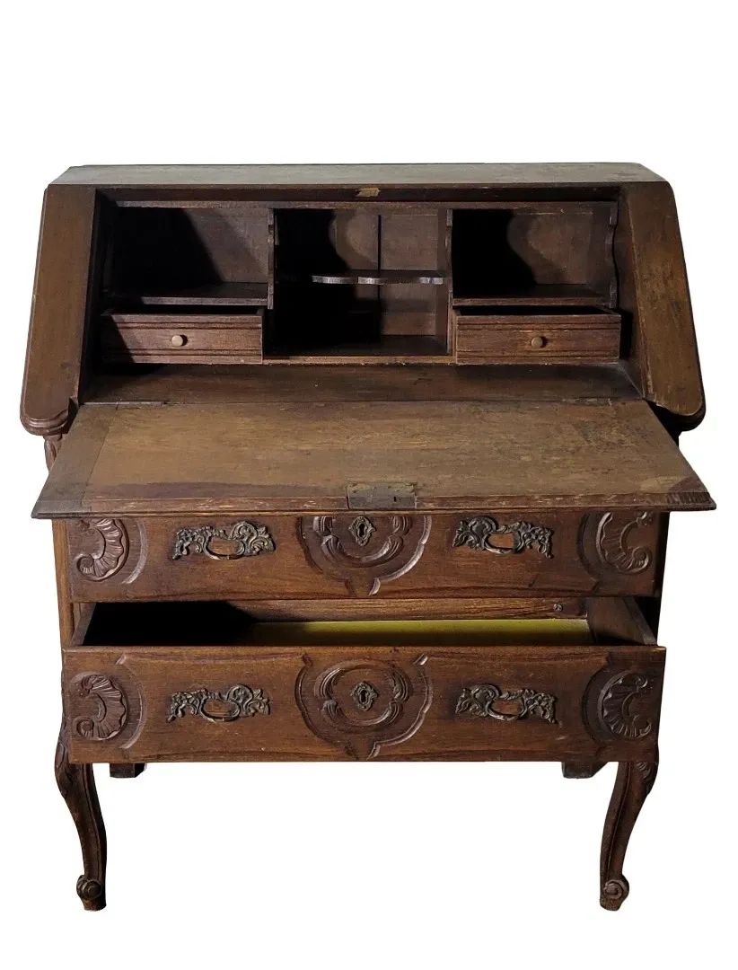 Antique solid wood secretary richly carved, in the Louis XV style.