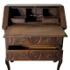 Antique solid wood secretary richly carved, in the Louis XV style.