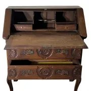 Antique solid wood secretary richly carved, in the Louis XV style.