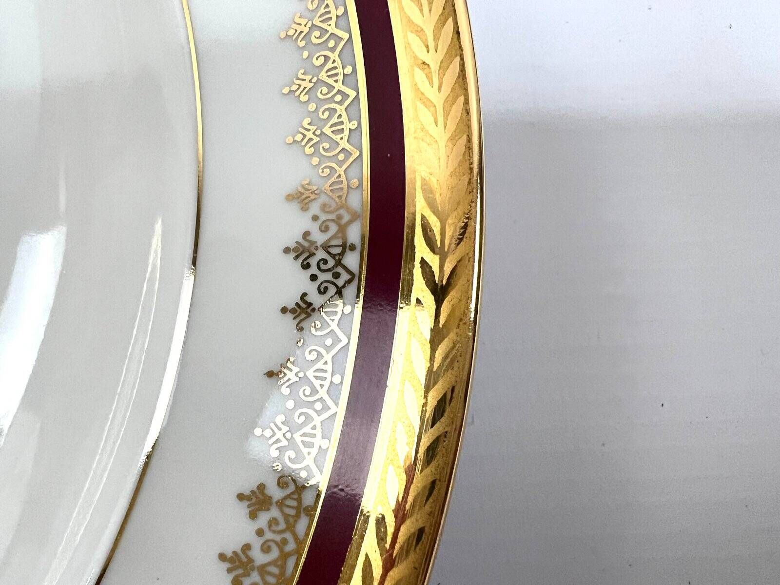 Porcelain plates and fish decoration sauce boat from Limoges, 1980s, set of 13.