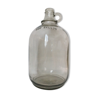 Cylinder transparent cylindrical demijohn of "one gallon"