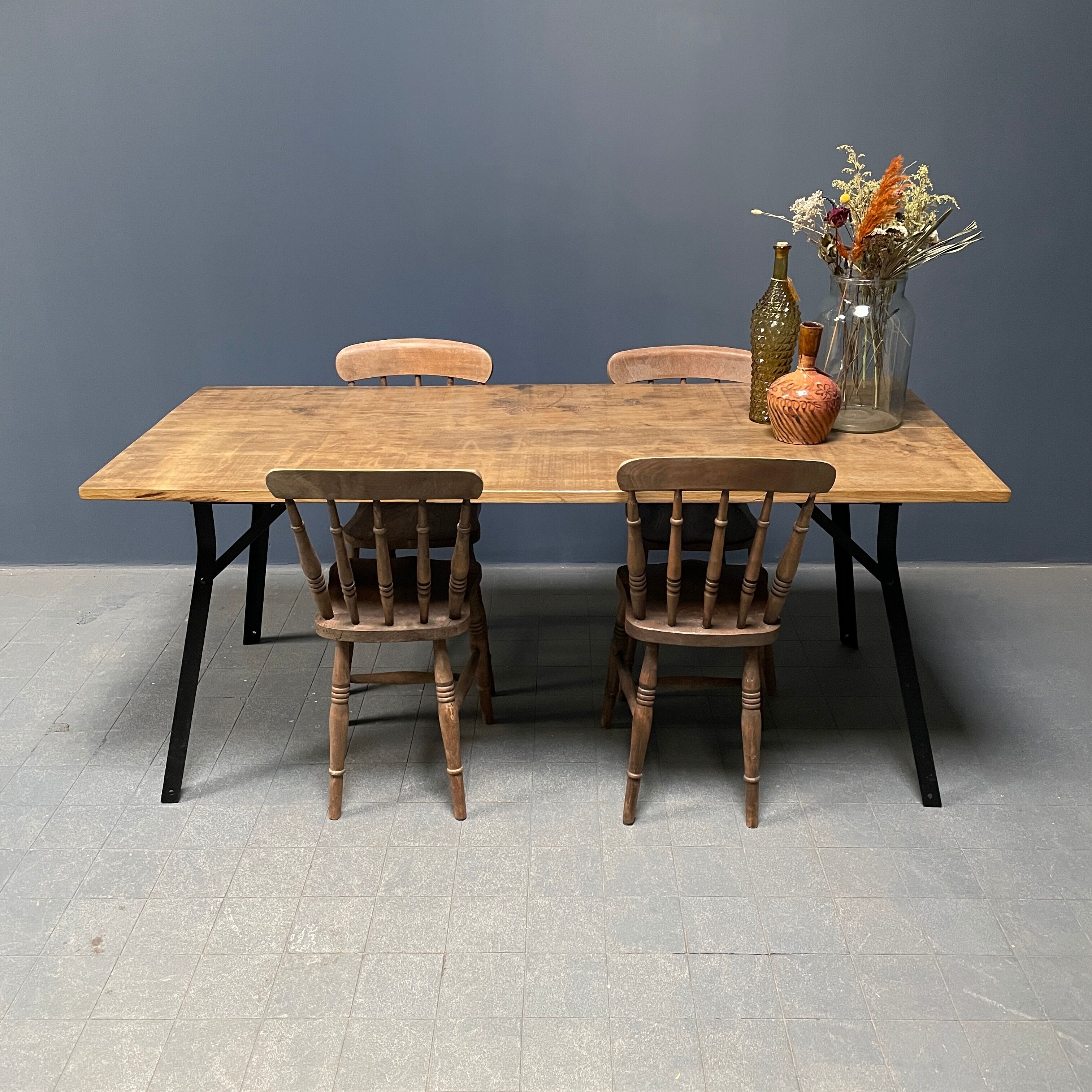Handmade industrial oak dining table with black metal legs