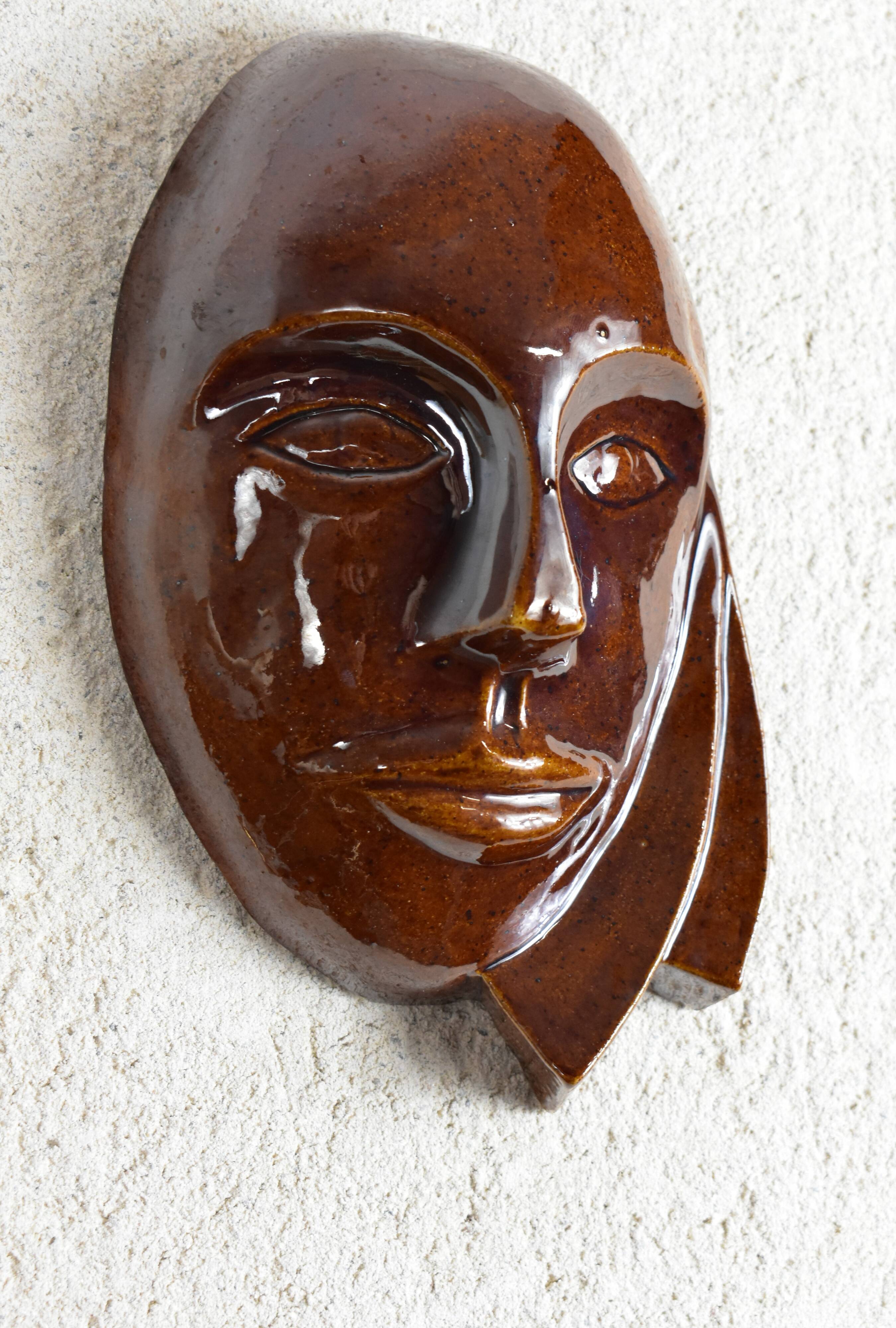 Signed brown enamel mask