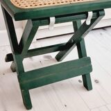 Small folding stool in green wood and cane