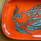 Orange ceramic fish platter