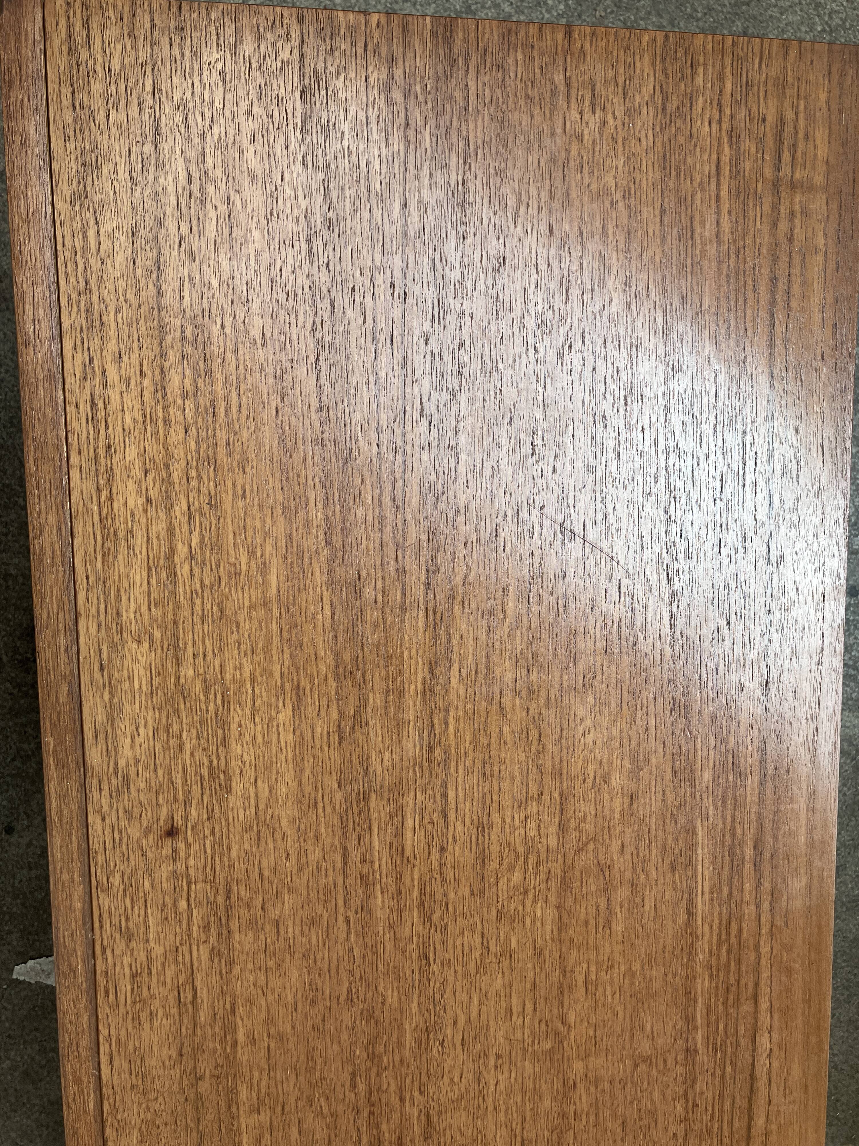 Teak sideboard with flap, 2 drawers and conical legs.