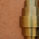 Round Art Deco wall light in brass.