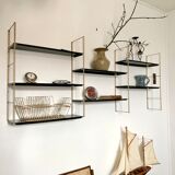 Vintage wall shelves in gold and black metal