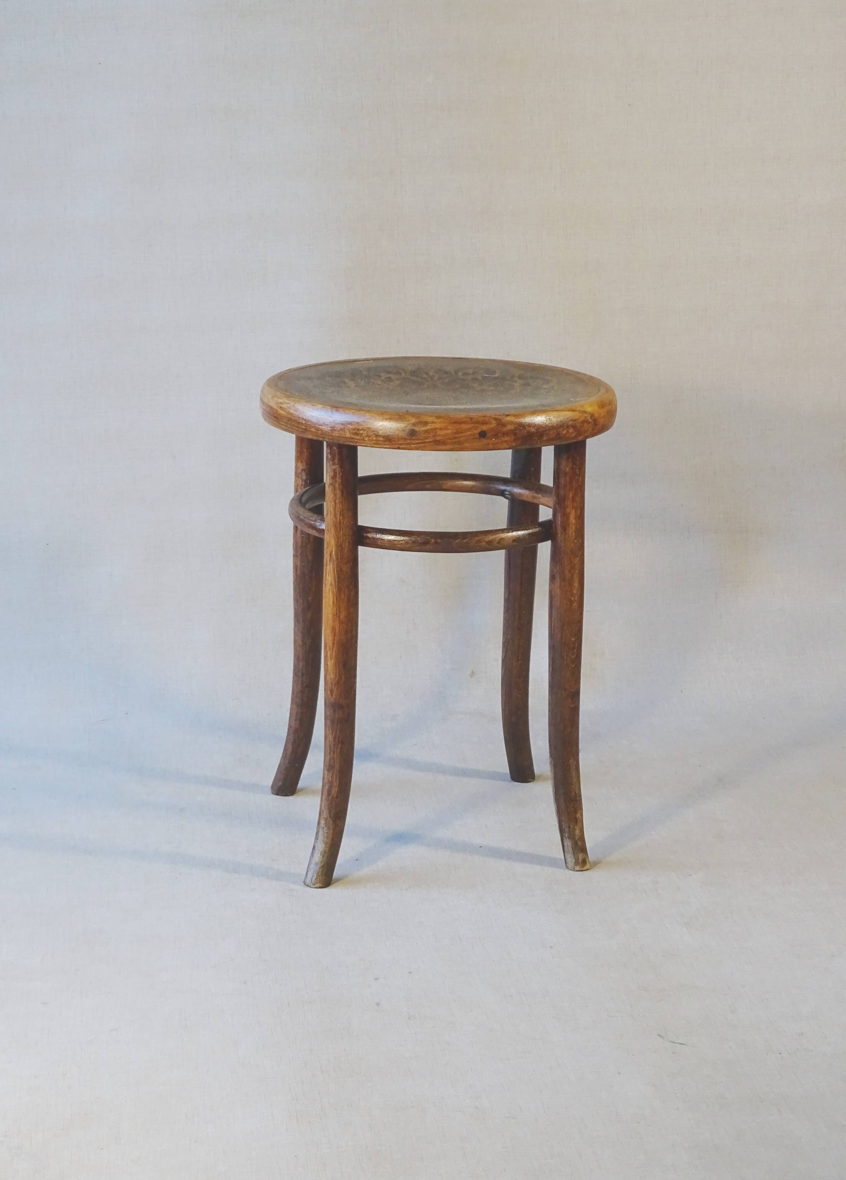 Low stool with wooden seat, circa 1930