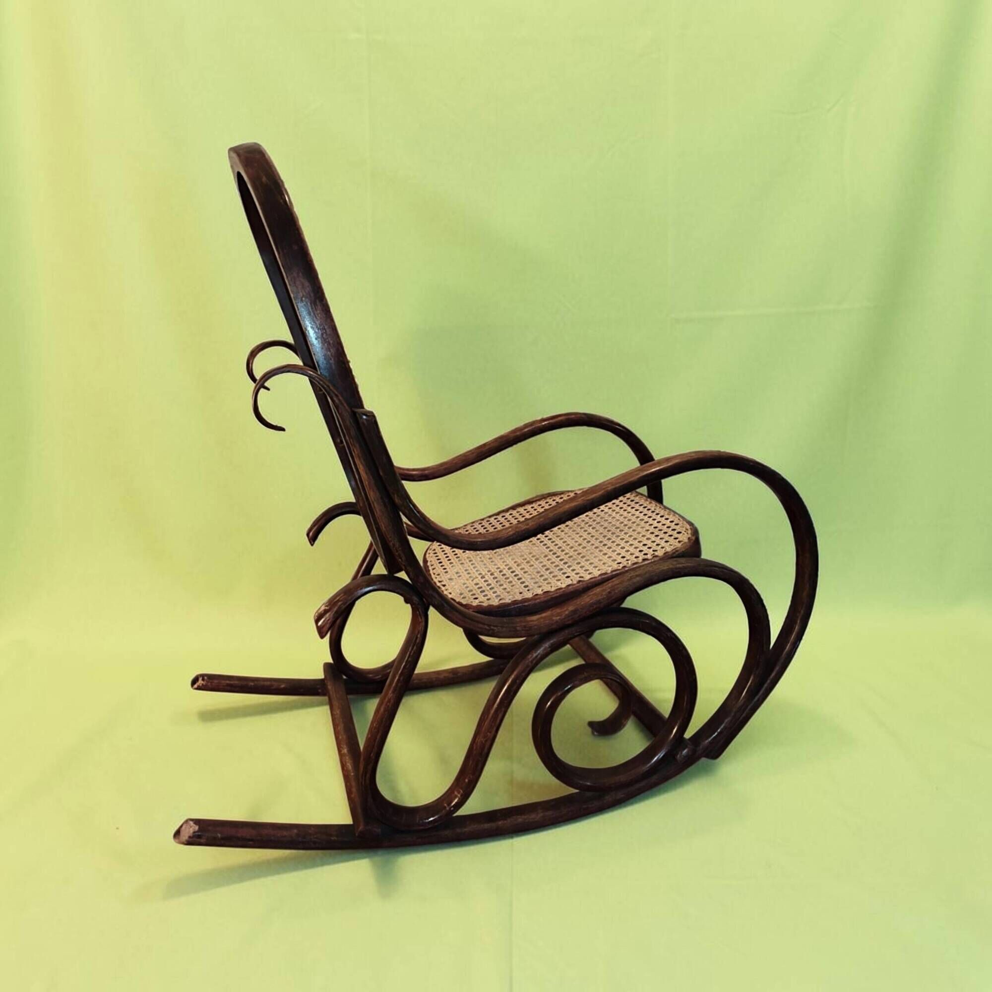 Antique curved wooden rocking chair with caning in Thonet style - Child size
