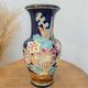Large multicoloured ceramic vase with floral decoration signed NT.