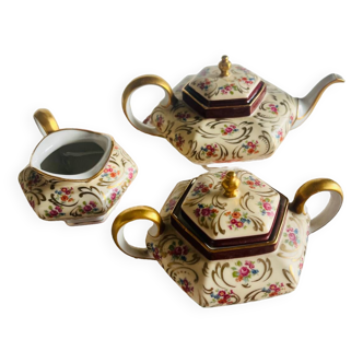 Limoges porcelain teapot, milk jug and sugar bowl set