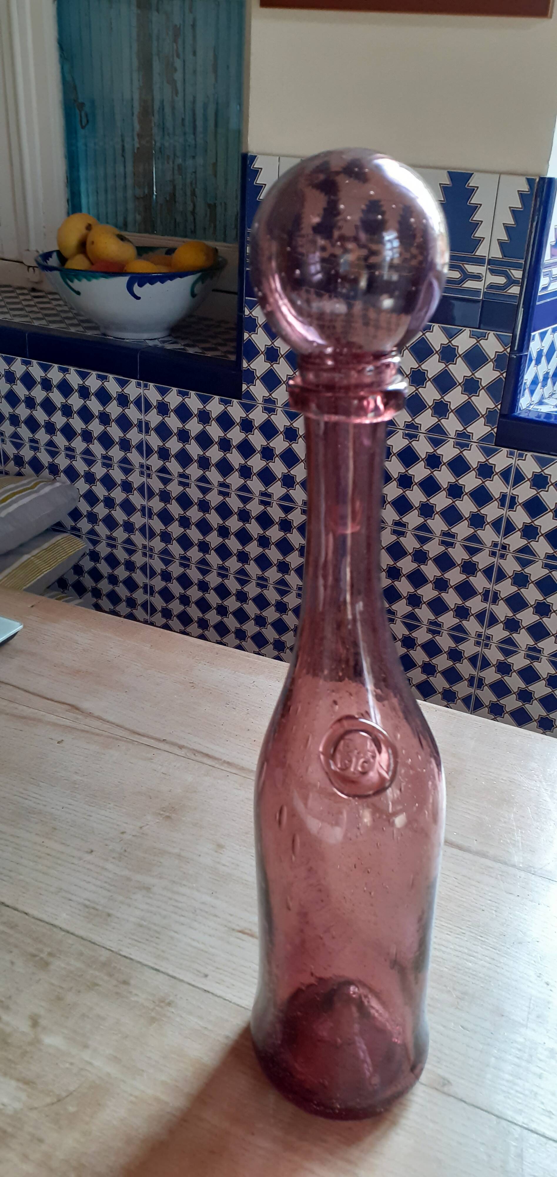 Old long Biot glass bottle