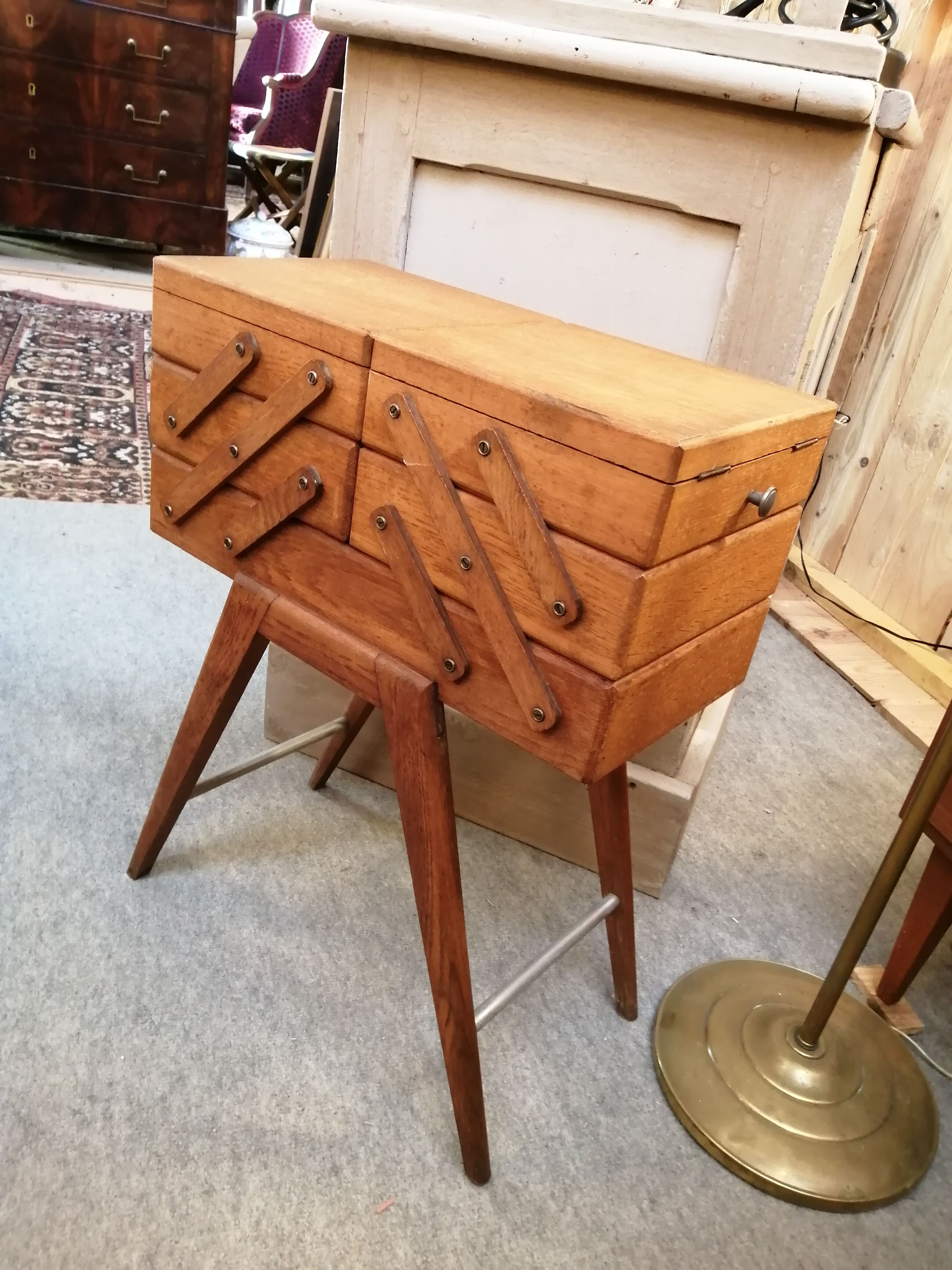 Worker sewing box feet compass