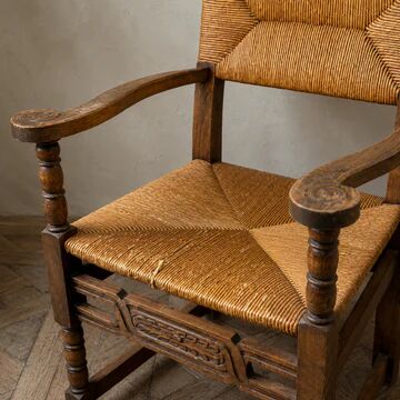 Rustic armchair made of woven rush, 1960s–1970s.