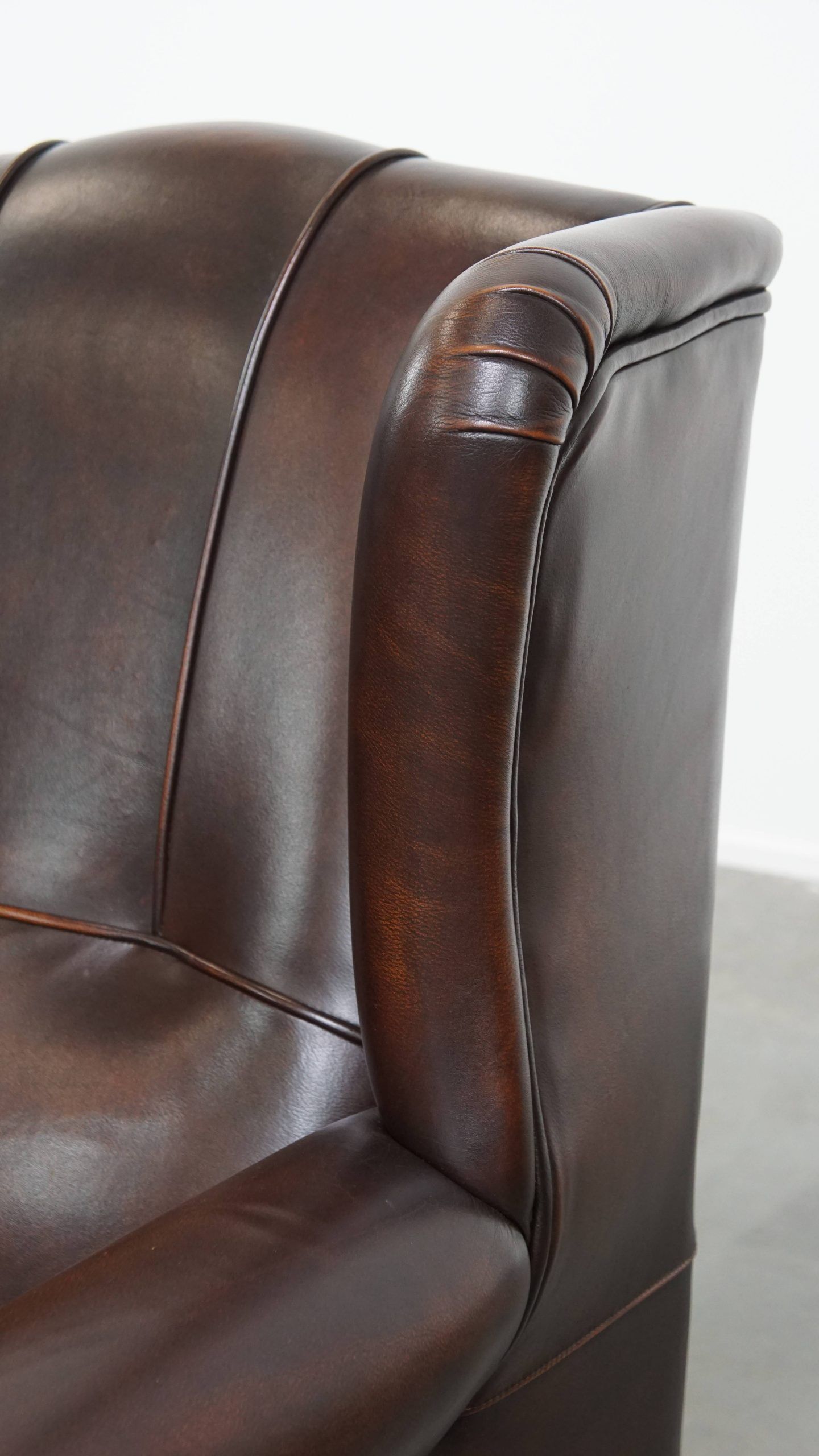 Very beautiful wing chair made of cowhide leather in English style