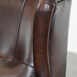 Very beautiful wing chair made of cowhide leather in English style