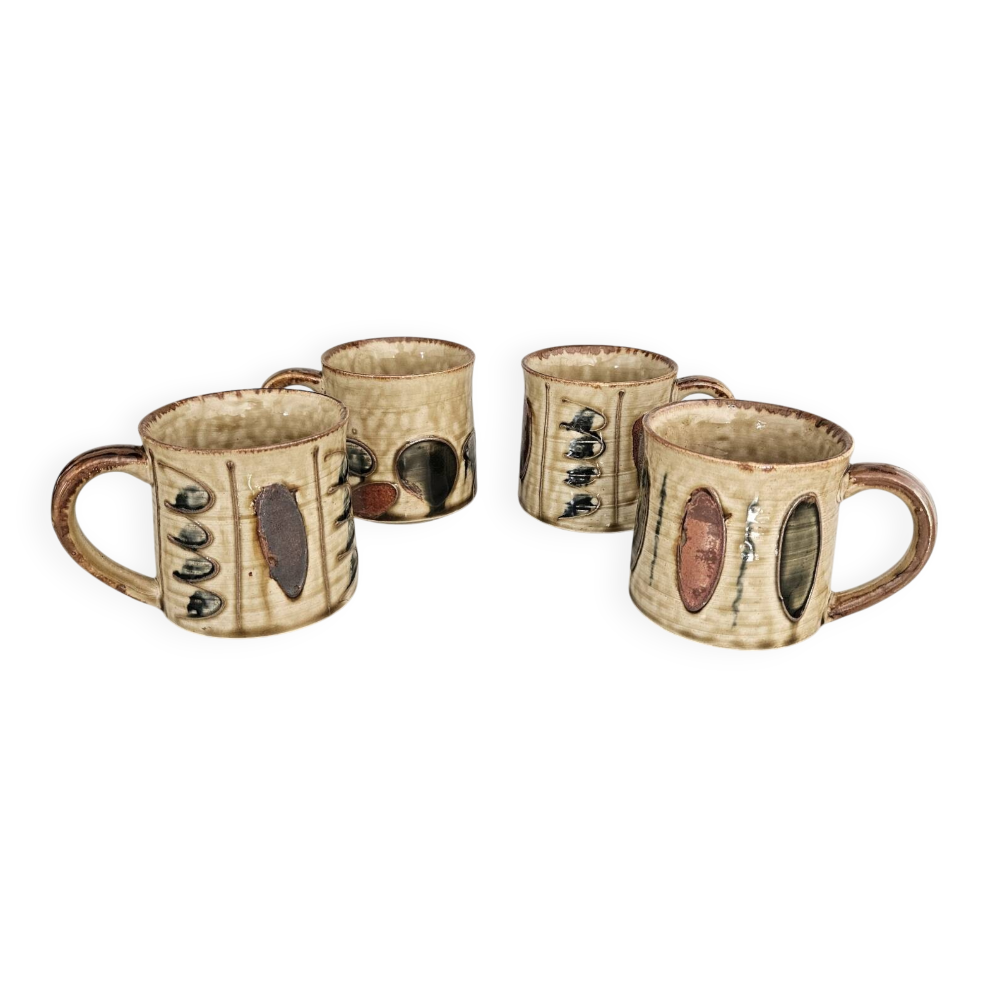 Set of 4 ceramic mugs, glazed stoneware, assorted vintage designs.