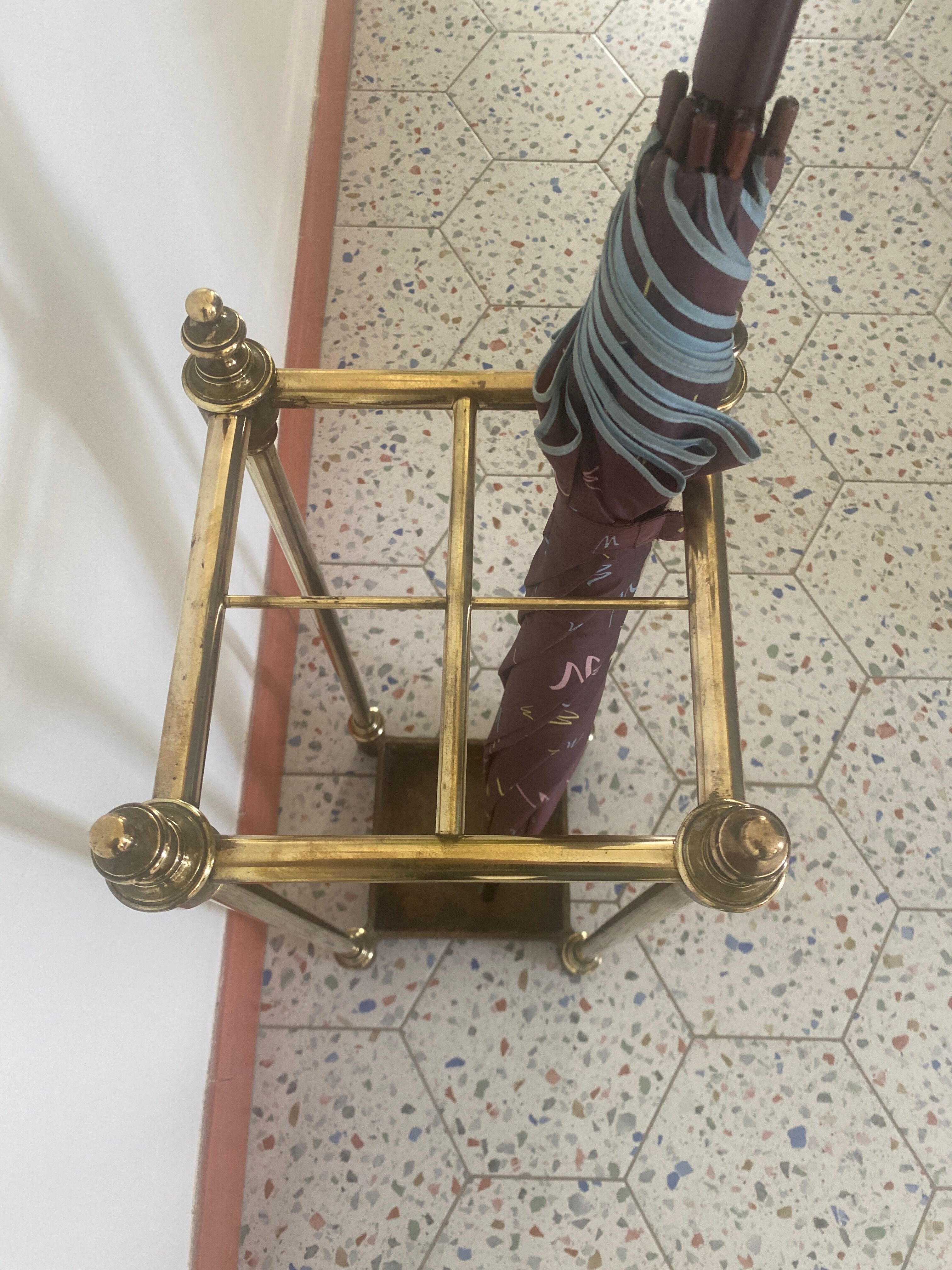 Brass and cast iron umbrella door