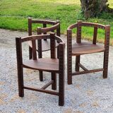 Set of three brutalist tripod armchairs in carved solid oak