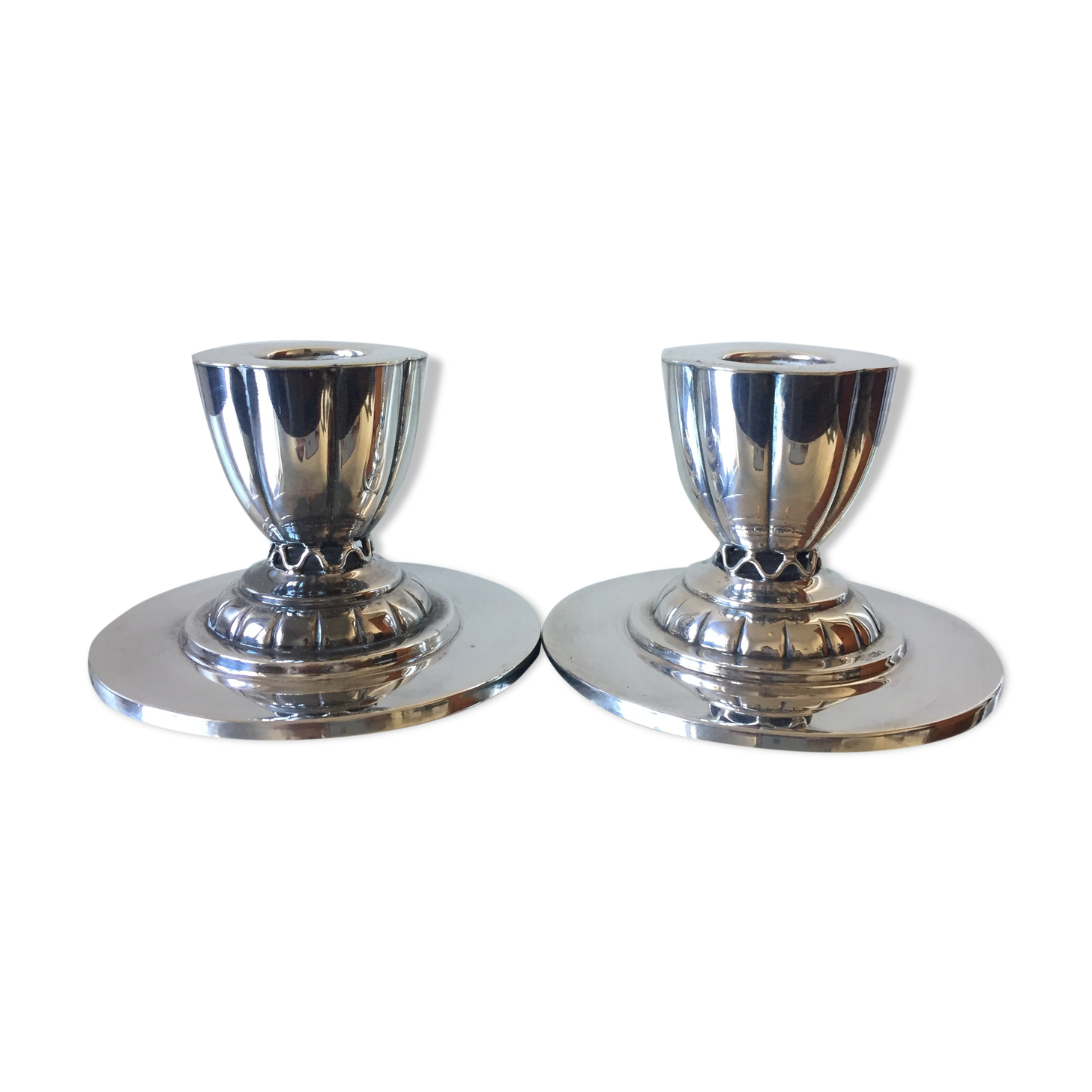 Paire de porte-bougies plaqués en argent art déco