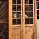 Antique glass-fronted cabinet in raw solid oak: display cabinet bookshelf.
