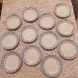 Set of 12 ironstone plates model "Andrée", Creil and Montereau, 23cm