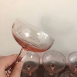 Champagne glass in pink glass with floral engraving