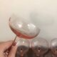 Champagne glass in pink glass with floral engraving
