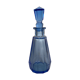 Blue chiseled glass bottle